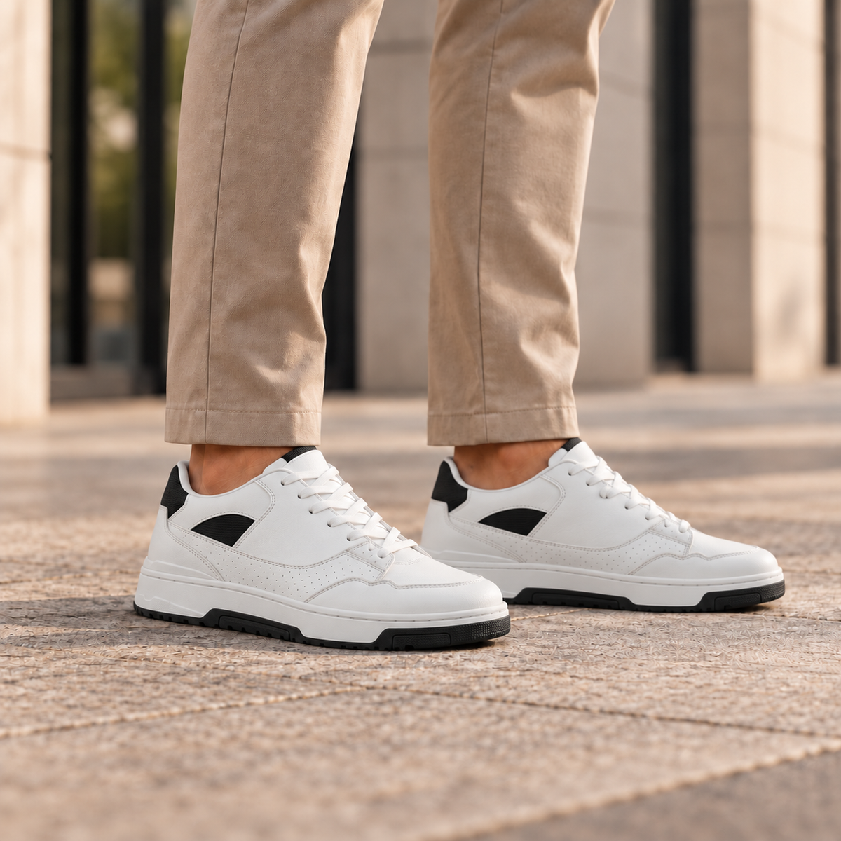 Kosen mars shoes worn with tailored trousers, close view below the knees. Plain tongues without lace keepers.