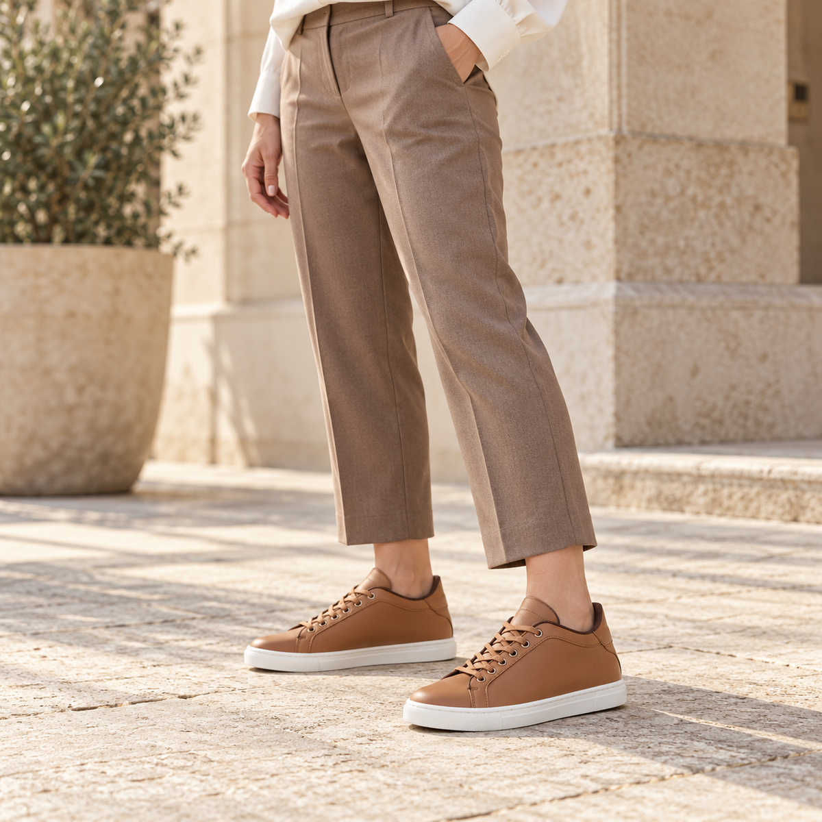 Woman wearing Kosen Mercury Brown elevator sneakers.