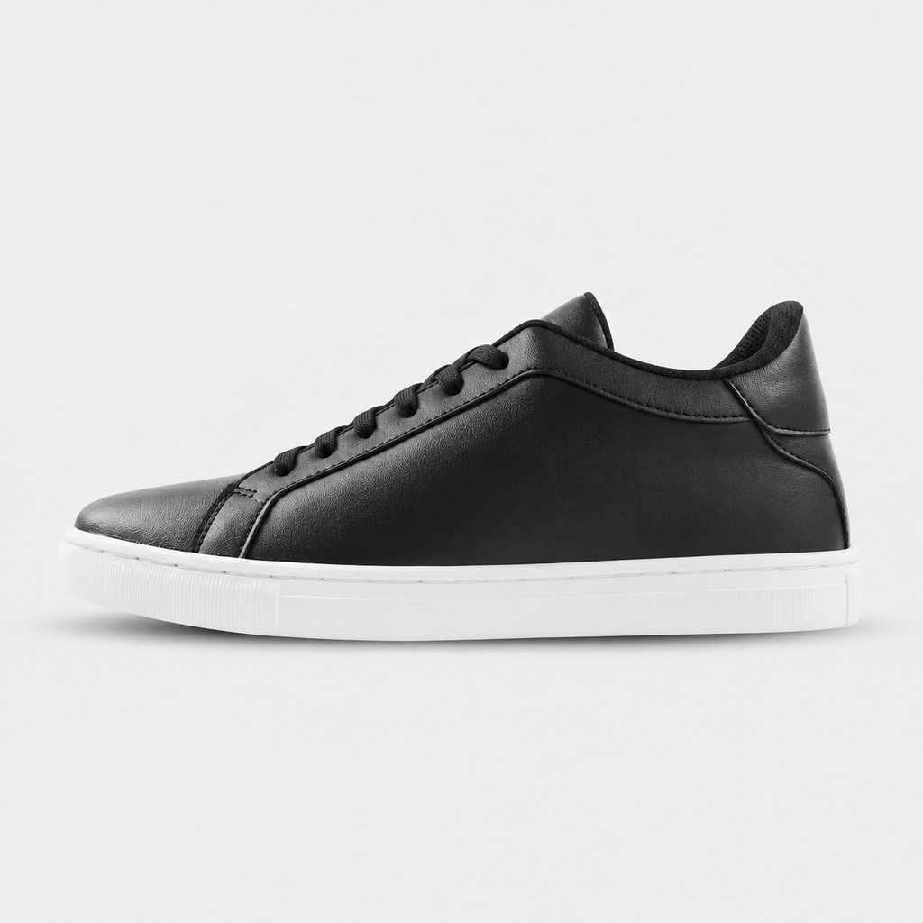 Side view of Kosen Mercury Black elevator sneakers with a black upper and white soles.