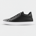 Side view of Kosen Mercury Black elevator sneakers with a black upper and white soles.