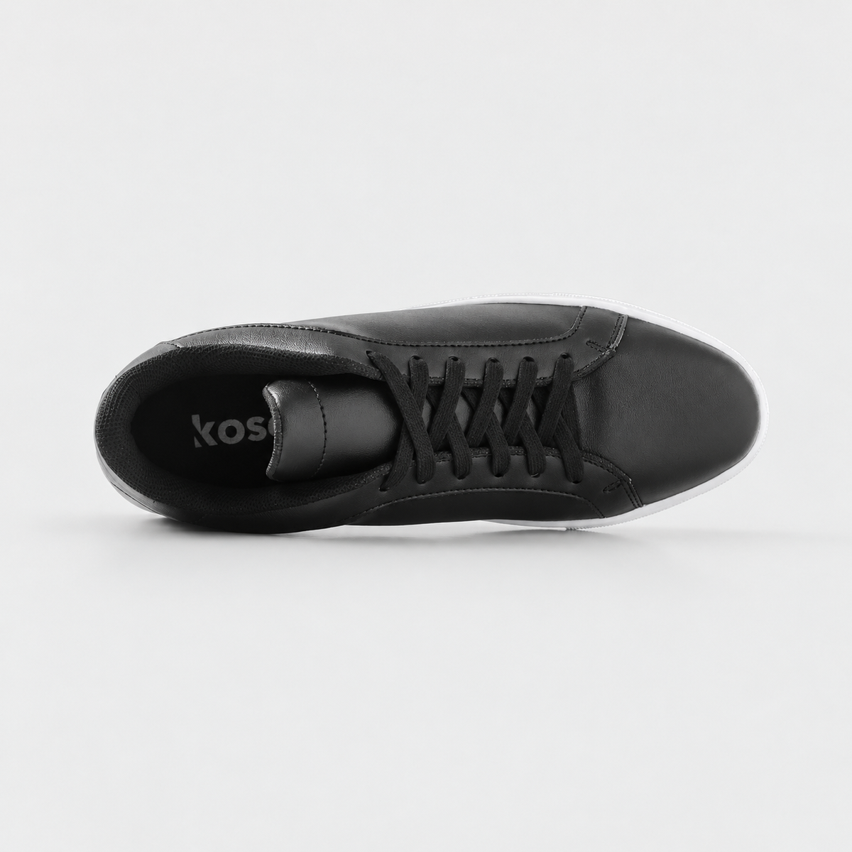 Top view of Mercury Black elevator sneakers showing soft inner lining and hidden height increasing structure.