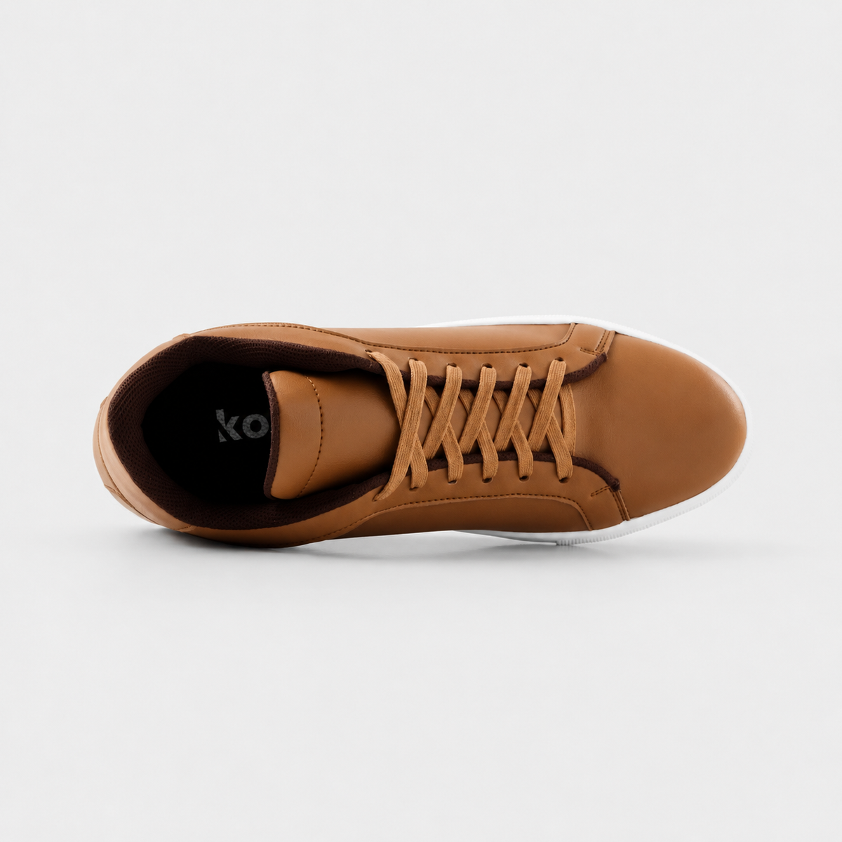 Top view of Mercury Brown elevator sneakers showing cushioned lining and hidden height increasing structure.
