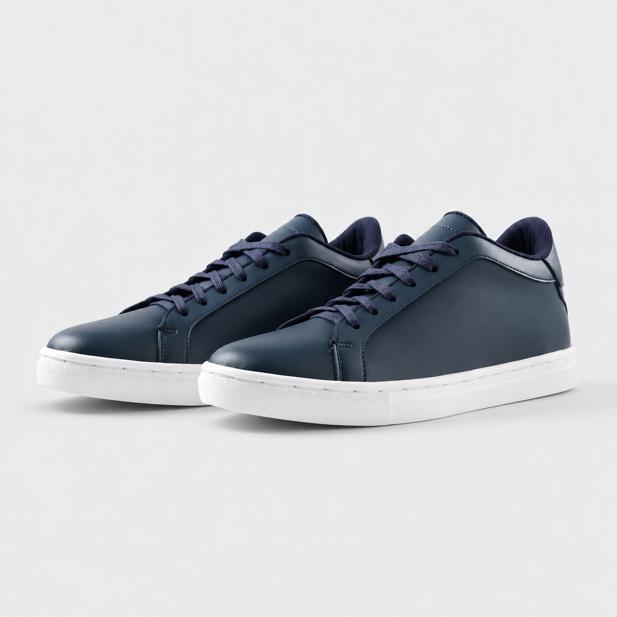 Pair of Kosen Mercury Navy height-increasing sneakers with a hidden 2-inch lift.