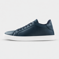 Side view of Kosen Mercury Navy elevator sneakers in deep blue with contrasting white soles.