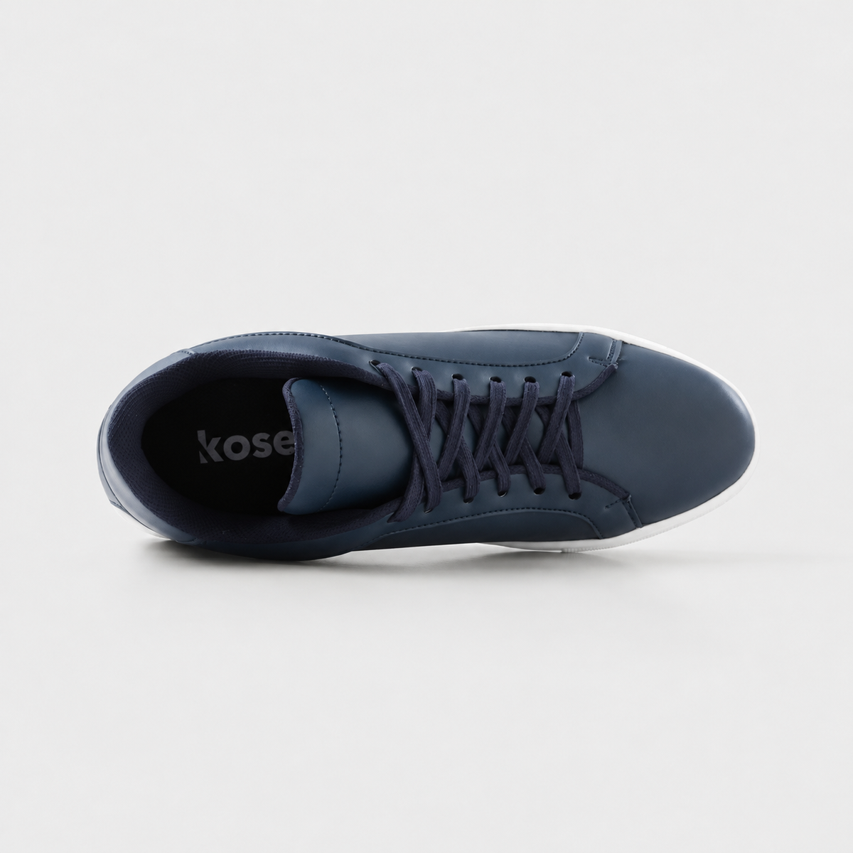 Top view of Mercury Navy elevator sneakers showing blue cushioned lining and hidden height increasing structure.