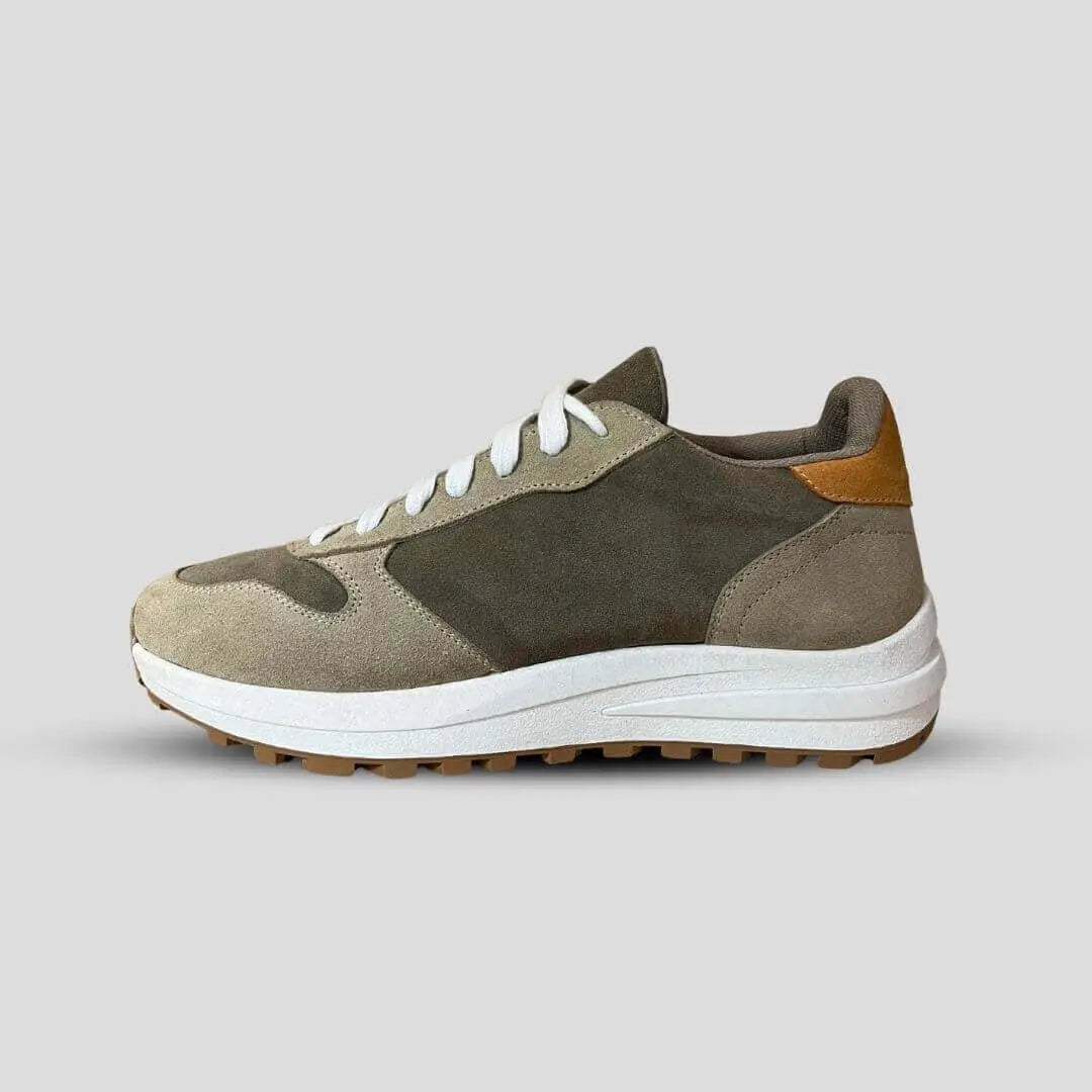 Side view of Saturn Olive elevator sneakers. Retro style green suede height increasing runners with white midsole.