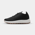 Side view of Venus Black elevator sneakers. Breathable knit height increasing shoes with athletic fit.