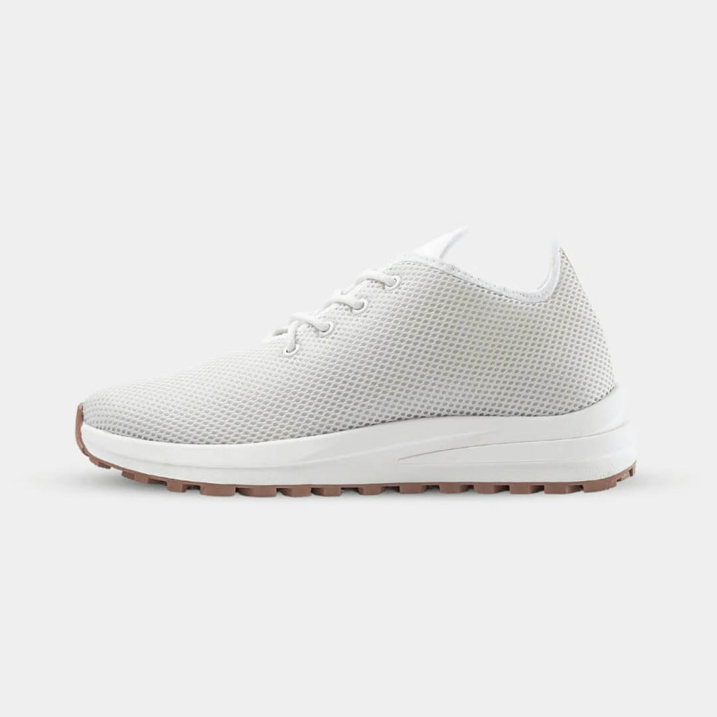 Side view of Venus White elevator sneakers. Breathable white knit height increasing shoes for summer.